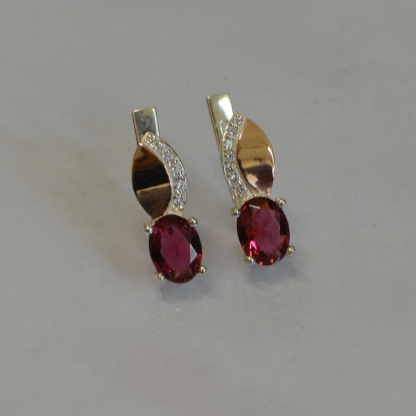 Срібні сережки з золотими вставками