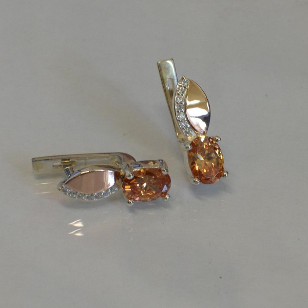 Срібні сережки з золотими вставками