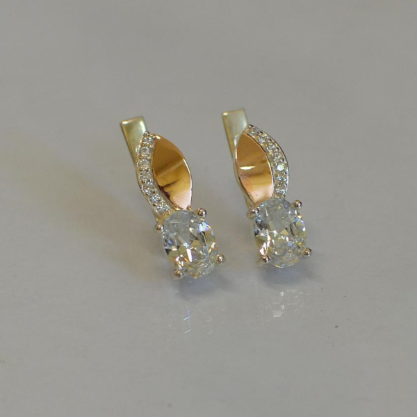 Срібні сережки з золотими вставками