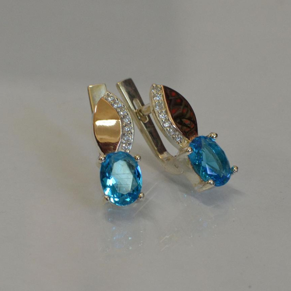 Срібні сережки з золотими вставками