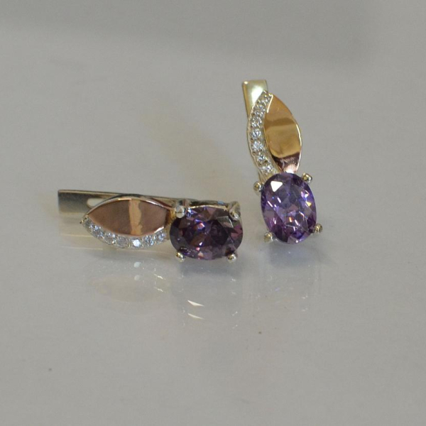 Срібні сережки з золотими вставками