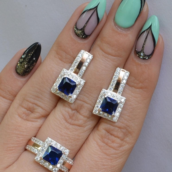 Срібний набір із золотими вставками