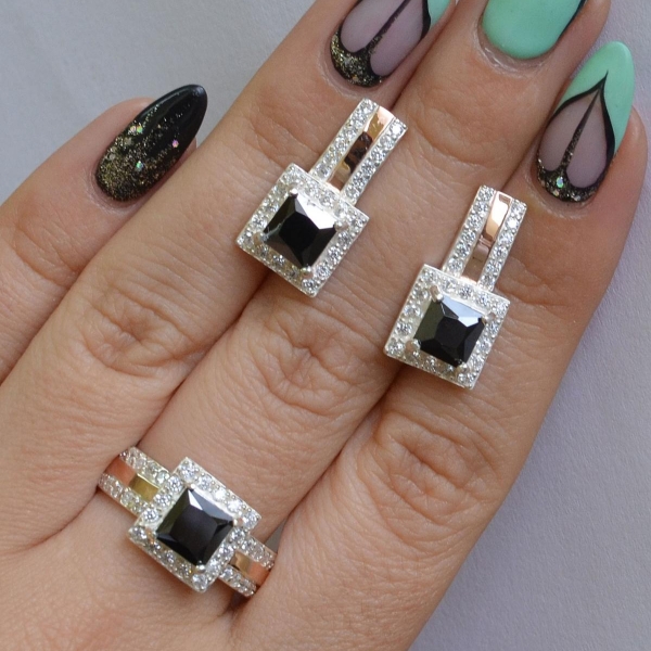 Срібний набір із золотими вставками