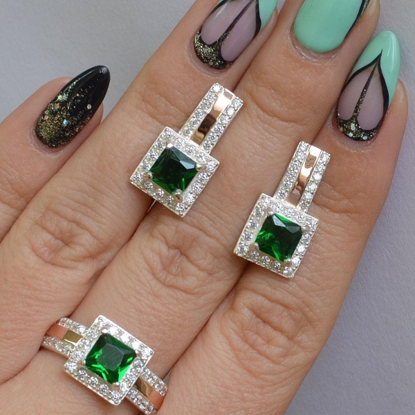 Срібний набір із золотими вставками