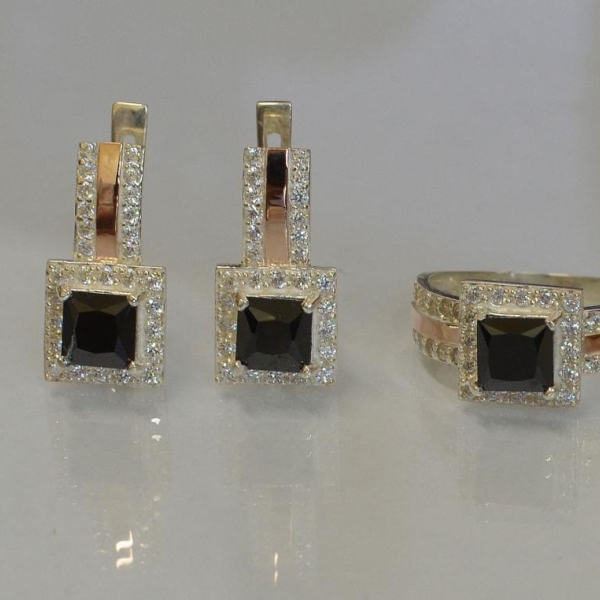 Срібний набір із золотими вставками