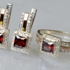 Срібний набір із золотими вставками