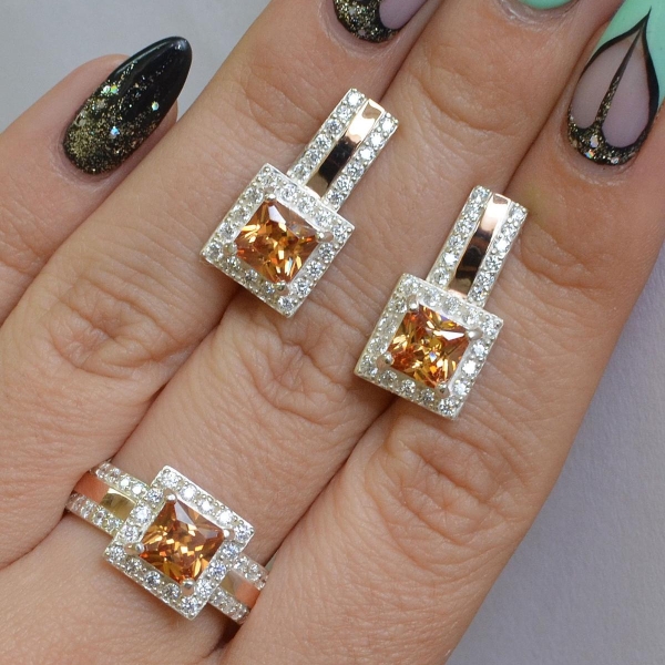 Срібний набір із золотими вставками