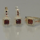 Срібний набір із золотими вставками