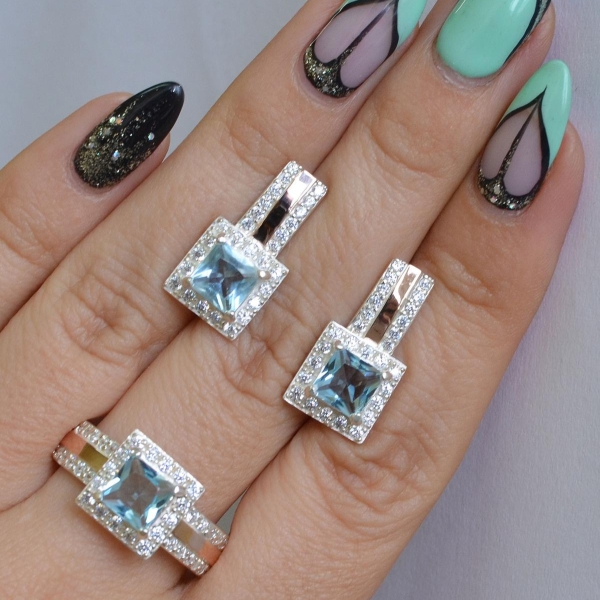 Срібний набір із золотими вставками