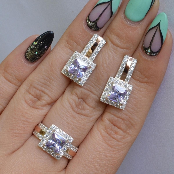 Срібний набір із золотими вставками