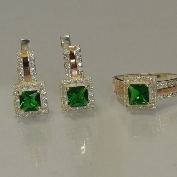 Срібний набір із золотими вставками