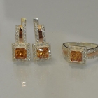 Срібний набір із золотими вставками