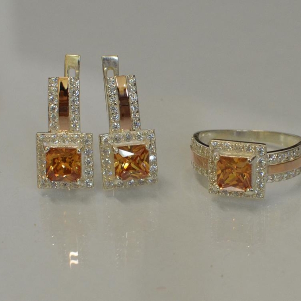 Срібний набір із золотими вставками