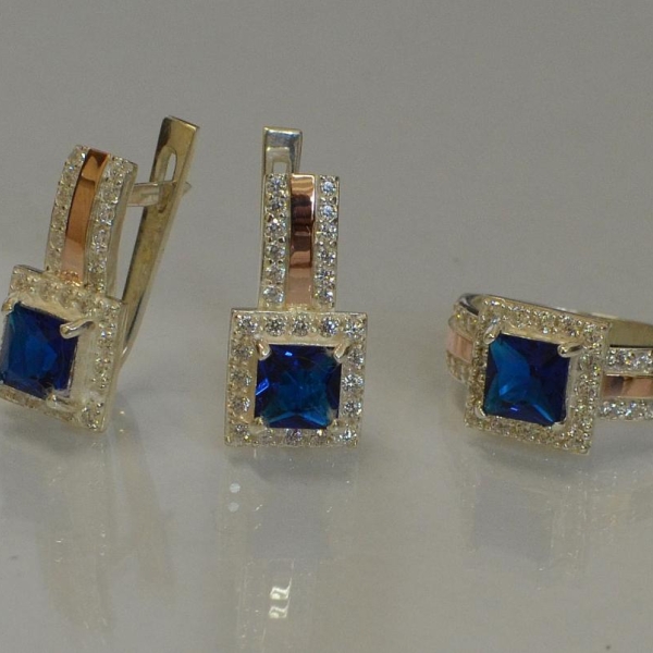 Срібний набір із золотими вставками