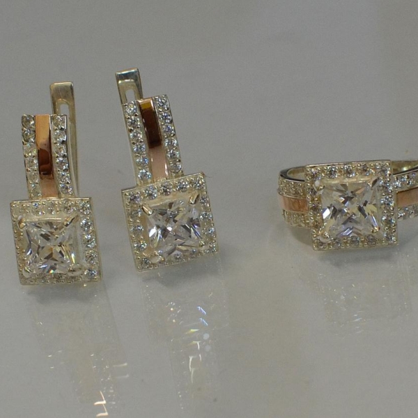 Срібний набір із золотими вставками