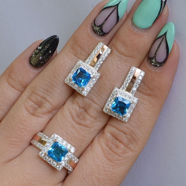 Срібний набір із золотими вставками