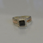 Серебряное кольцо с золотыми вставками