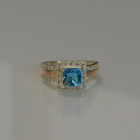 Серебряное кольцо с золотыми вставками