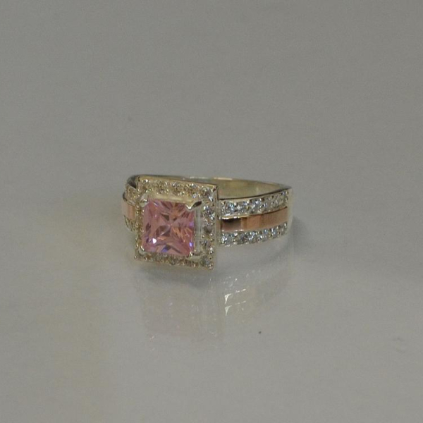 Серебряное кольцо с золотыми вставками