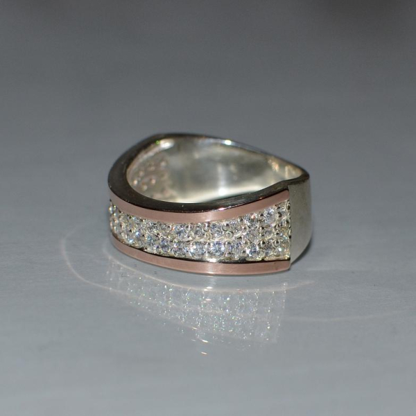 Срібна каблучка з накладками з золота