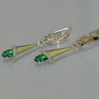 Срібні сережки з золотими напайками