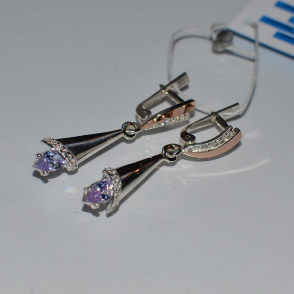 Срібні сережки з золотими напайками