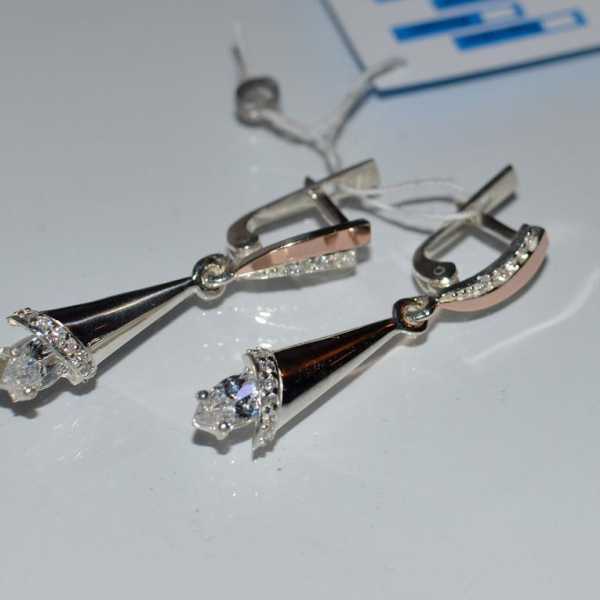 Срібні сережки з золотими напайками