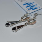 Срібні сережки з золотими напайками