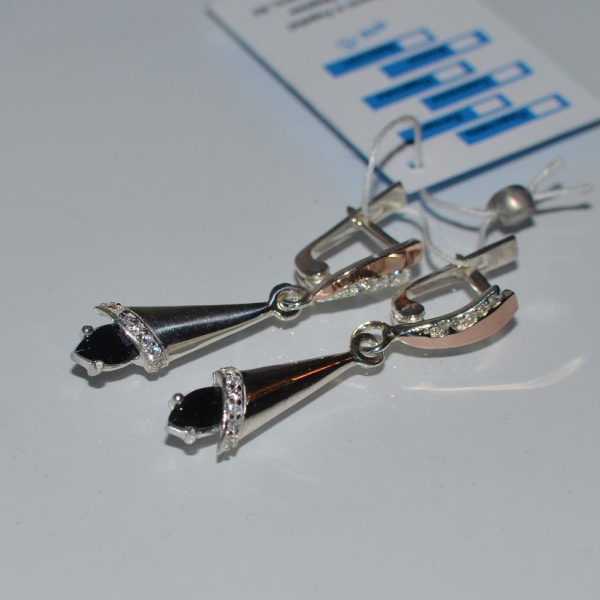 Срібні сережки з золотими напайками