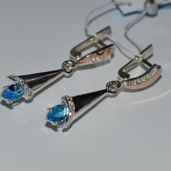 Срібні сережки з золотими напайками