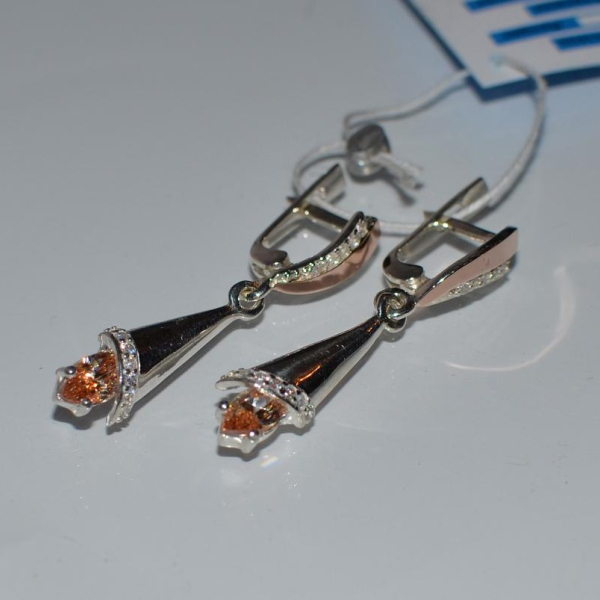 Срібні сережки з золотими напайками