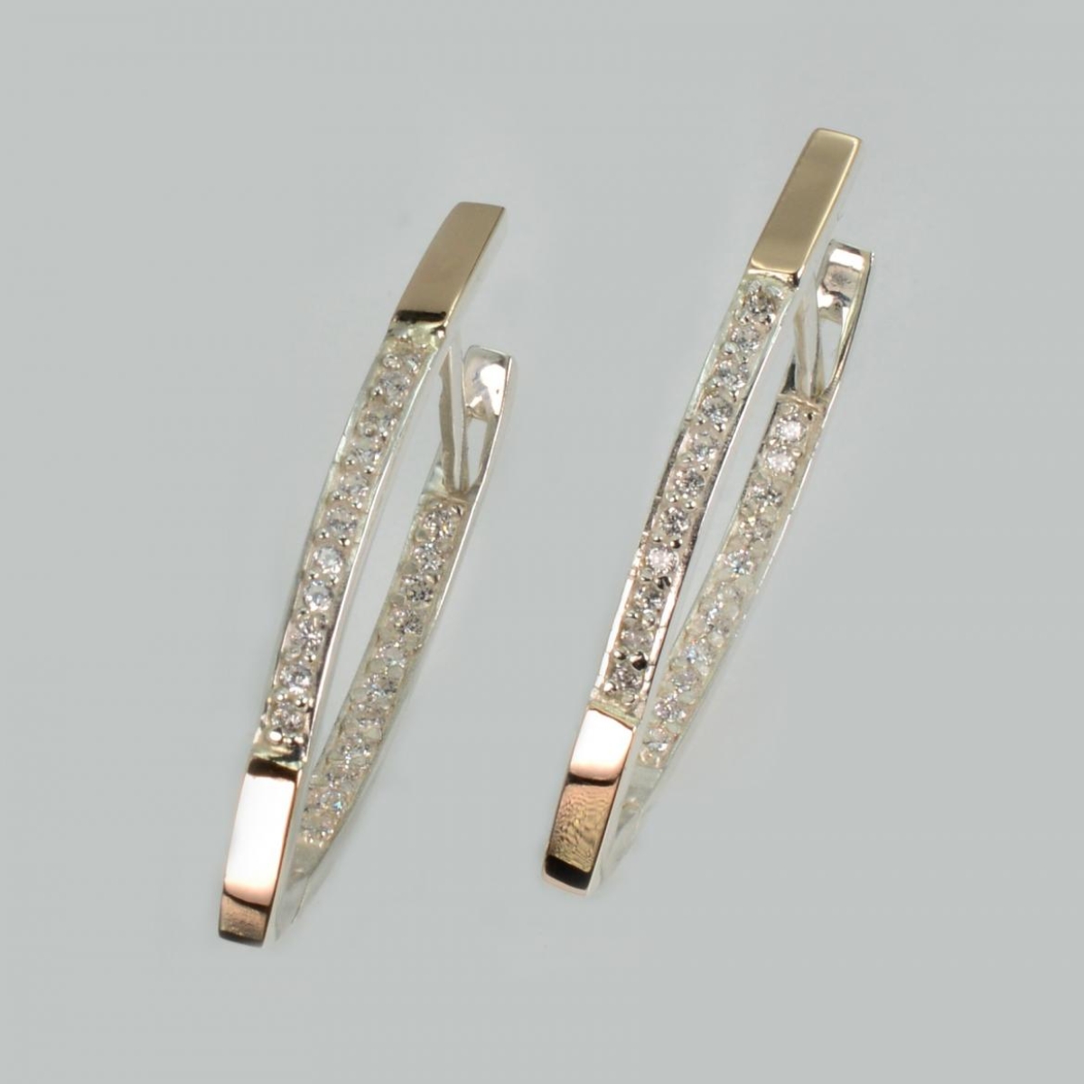 Срібні сережки з золотими вставками