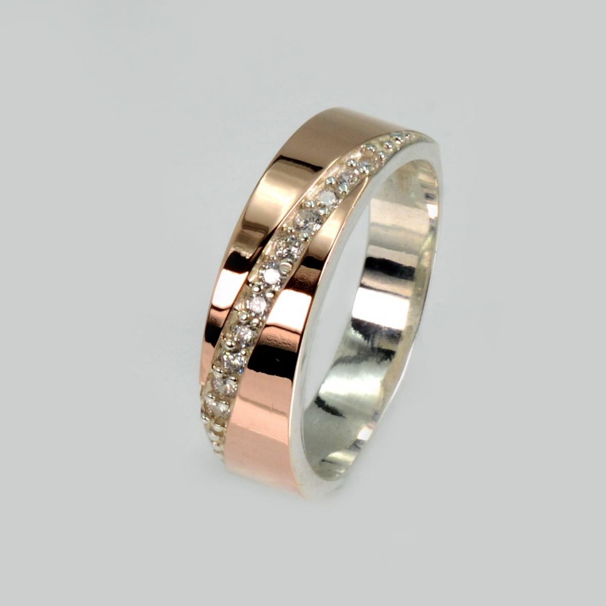 Срібна каблучка з пластинами із золота