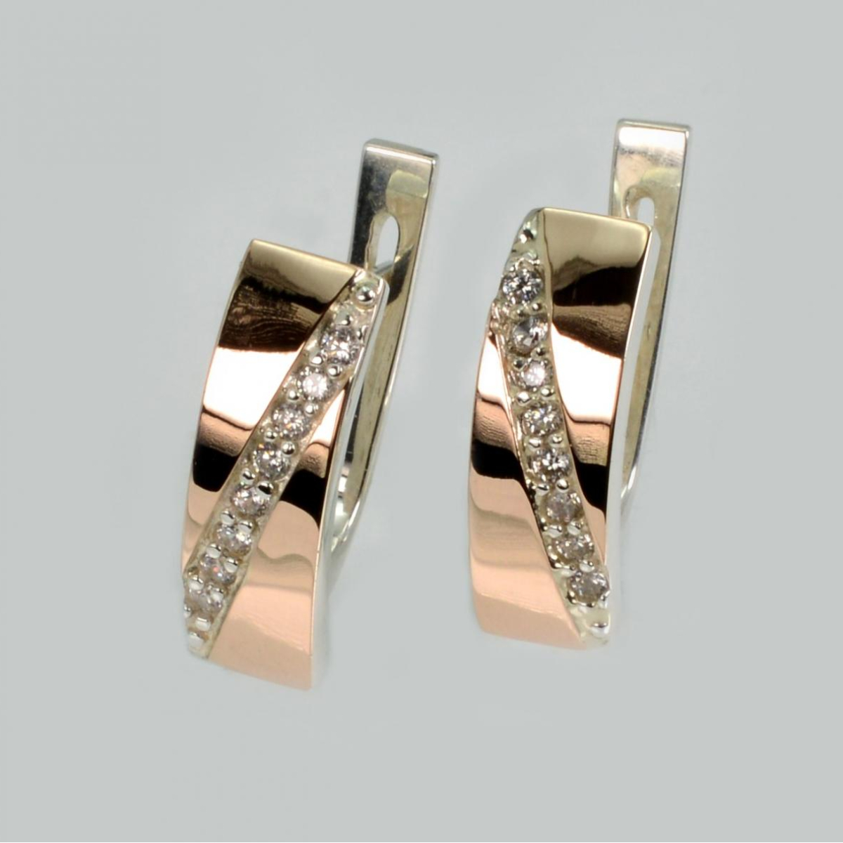 Срібні сережки з золотими пластинами