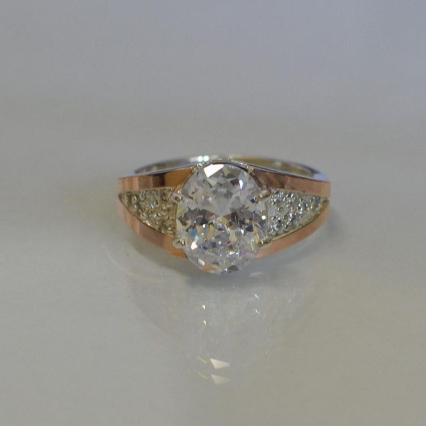 Срібна каблучка з золотими пластинами