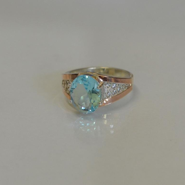 Срібна каблучка з золотими пластинами