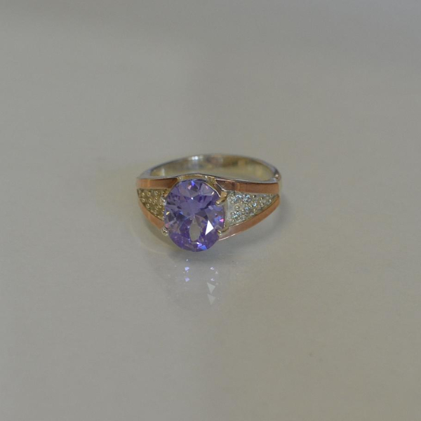 Срібна каблучка з золотими пластинами