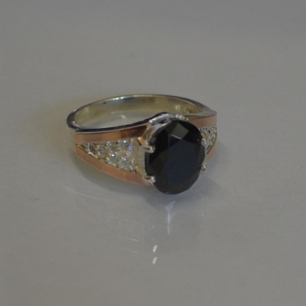 Срібна каблучка з золотими пластинами