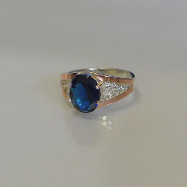 Срібна каблучка з золотими пластинами