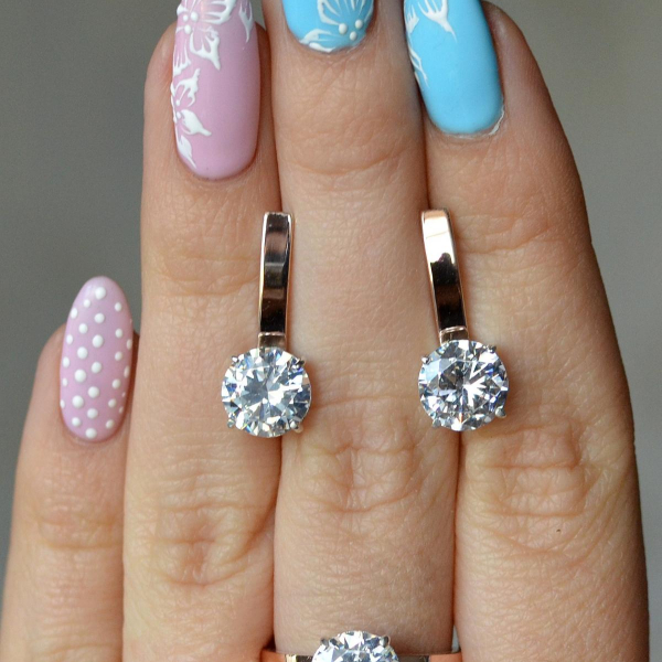 Срібний гарнітур із золотими вставками