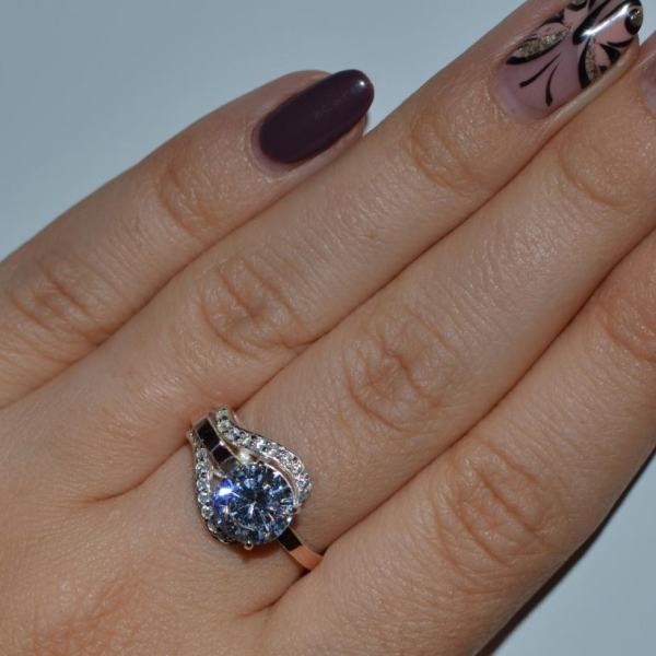 Срібна каблучка з накладками з золота