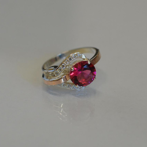 Срібна каблучка з накладками з золота