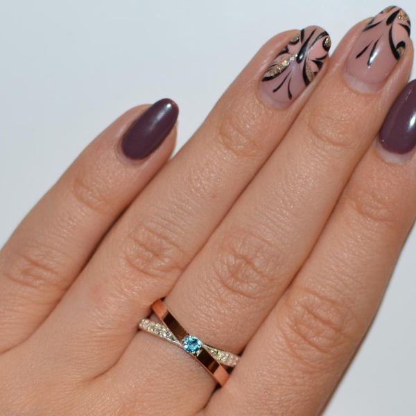 Серебряное кольцо со вставками из золота