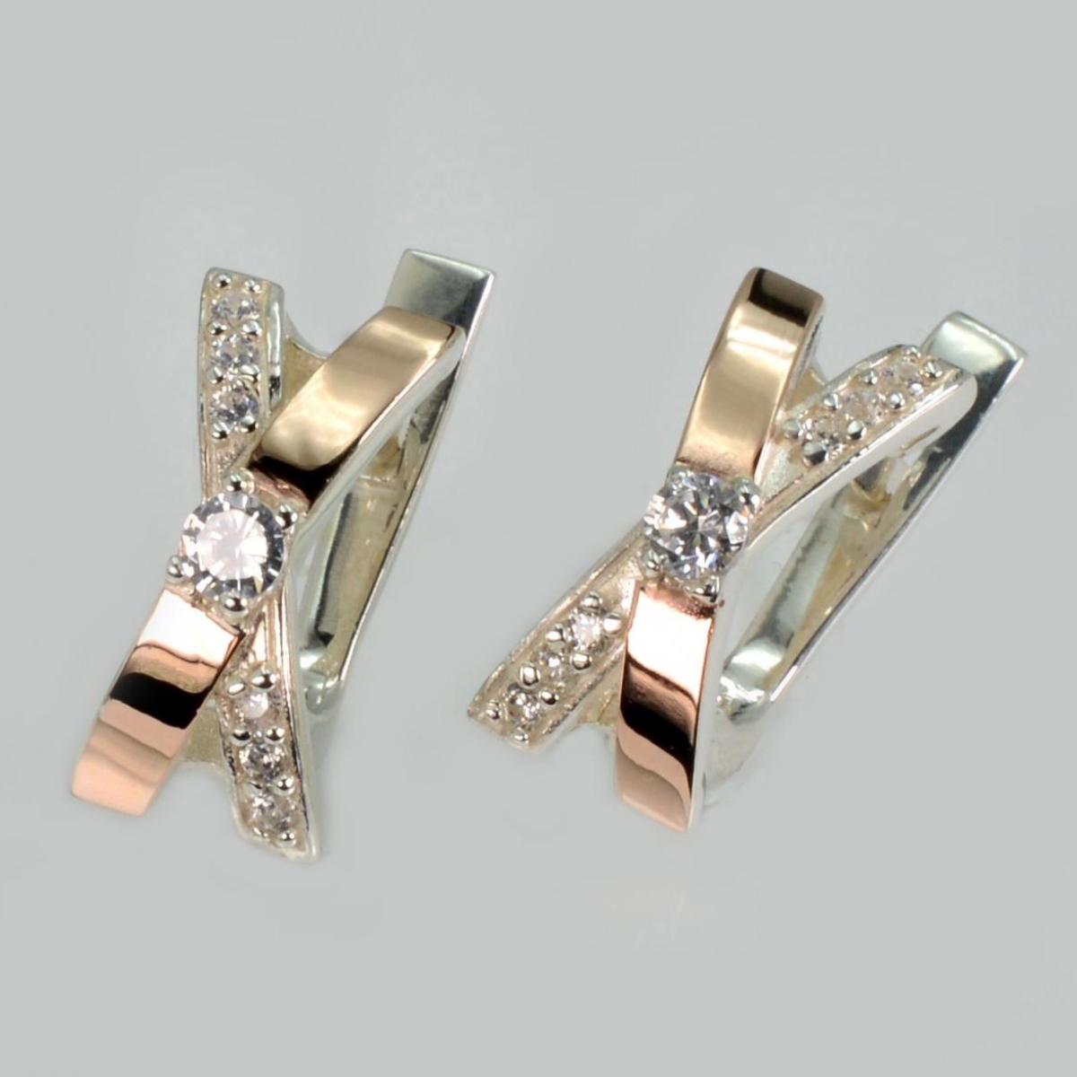 Срібні сережки з золотими пластинами