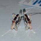 Срібні сережки з золотими пластинами