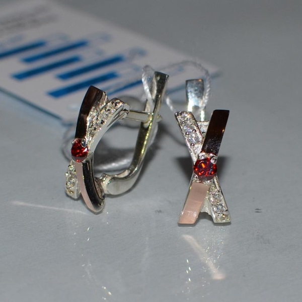 Срібні сережки з золотими пластинами