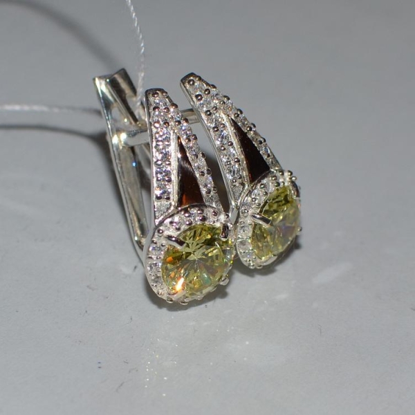 Срібні сережки з золотими напайками