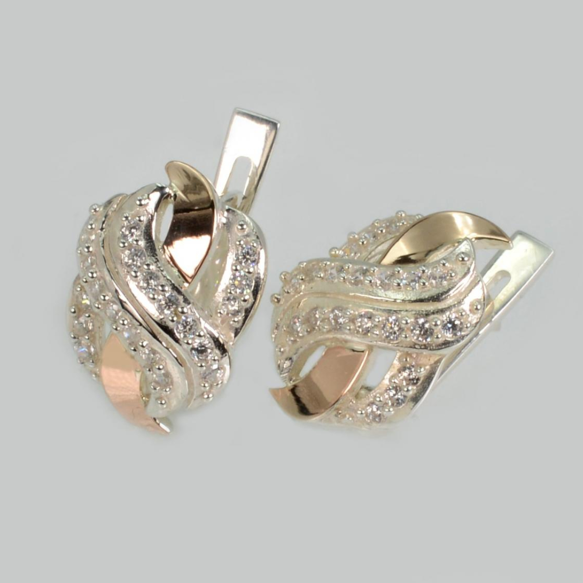 Срібні сережки зі вставками із золота