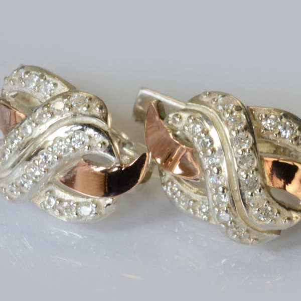 Срібні сережки зі вставками із золота