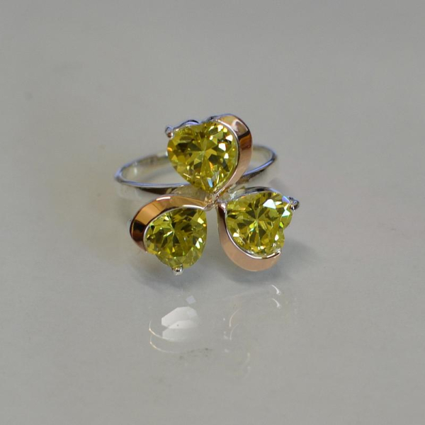 Срібна каблучка з пластинами із золота